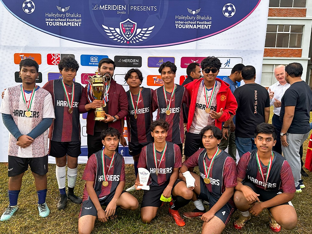 Haileybury Bhaluka students celebrating victory at HBIFT 2025 inter-school football tournament