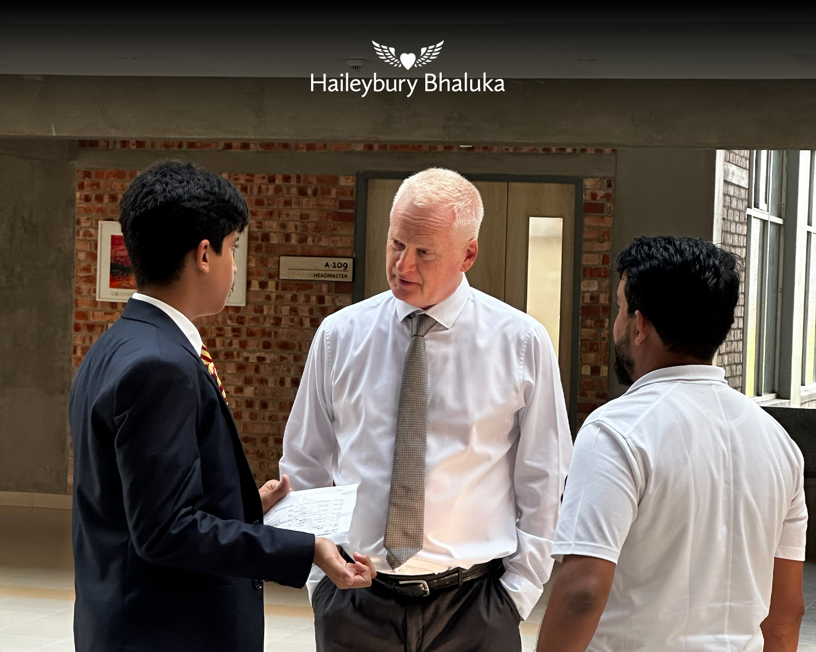 Parents and teachers engaging in discussion at Haileybury Bhaluka meeting