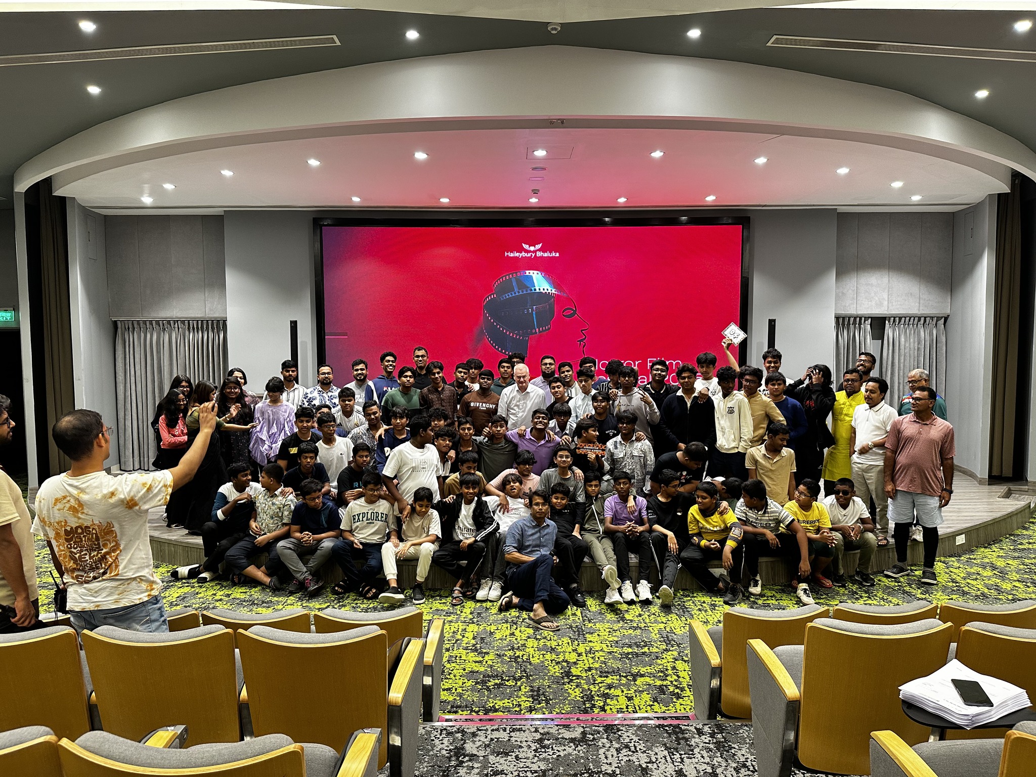 Haileybury Bhaluka students celebrating at the Horror Film Festival with applause and laughter