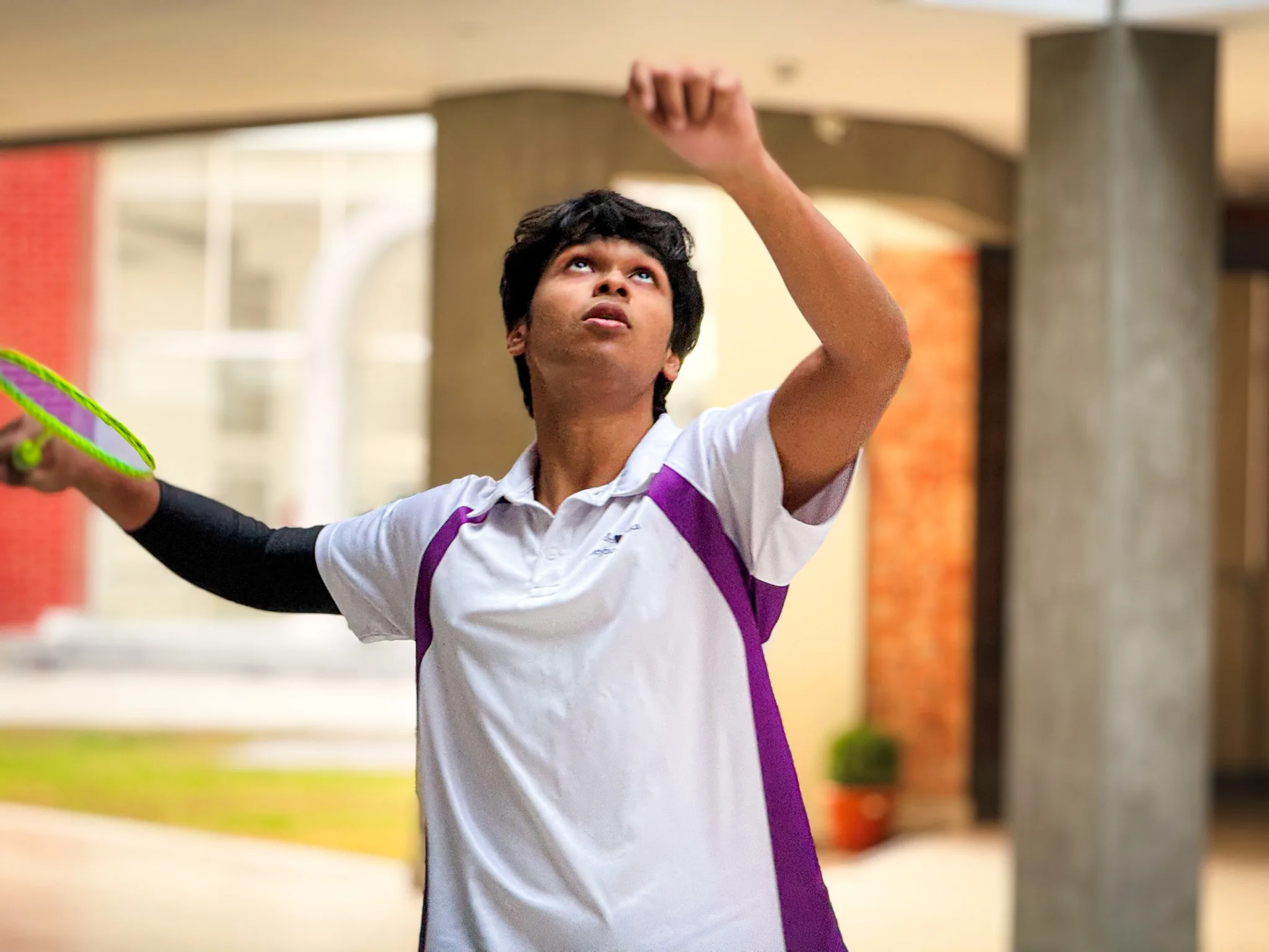 Students playing badminton at the Inter Year Badminton Fest.