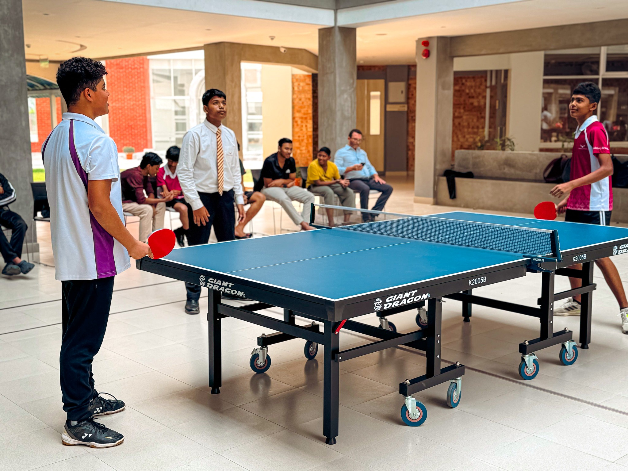 Students competing in the final rounds of the Inter Years Table Tennis Tournament 2025 at Haileybury Bhaluka
